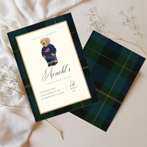 May include: A birthday invitation with a teddy bear illustration wearing a sweater and jeans. The invitation has a cream-coloured background with text that reads "Arnold's First Birthday" and event details. The border and back have a green and navy plaid pattern.