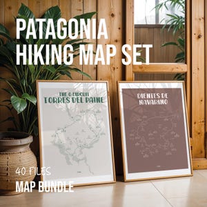 May include: Two framed hiking maps with the text "PATAGONIA HIKING MAP SET". One map is titled "THE O CIRCUIT TORRES DEL PAINE" and the other "DIENTES DE NAVARINO". The bottom of the frame reads "40 FILES MAP BUNDLE".