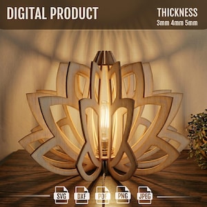 May include: A wooden lotus flower-shaped lamp with a light bulb in the center. The lamp is made of light-colored wood and has a layered design. The text "DIGITAL PRODUCT" and "THICKNESS 3mm 4mm 5mm" are visible. File type icons are also present.