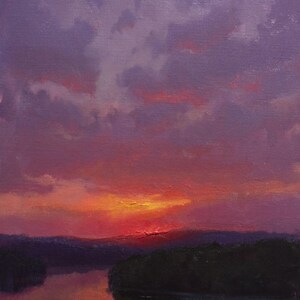 May include: Oil painting of a sunset over a river. The sky is filled with shades of purple, pink, and orange, with dark clouds and a bright sun. The river reflects the colors of the sky, and the foreground features a dark, silhouetted treeline.