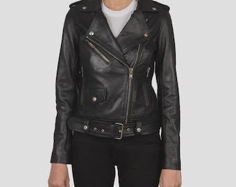 May include: A black leather jacket with a classic biker style. Features include an asymmetrical zipper, a notched collar, and a belt at the waist. The jacket has silver hardware and multiple pockets.