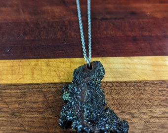 Bark and moss pendant on silver neck ring