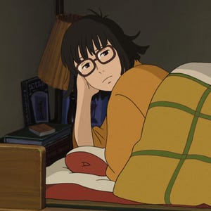 May include: An animated illustration of a person in bed, wearing glasses and an orange shirt, resting their head on their hand. A yellow blanket with green grid lines covers the person. Books and a lamp are visible in the background.