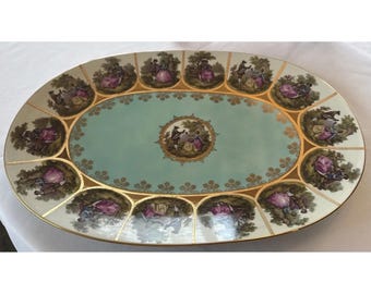 Fragonard Scenes Bavaria OTCO Plato de 16 5/8" x 11 3/8" con borde dorado.