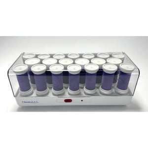 May include: A white and clear hair roller set with 20 purple rollers. The rollers are cylindrical with white caps and are stored in a white base with a clear plastic lid. The word "PROFILES" is printed on the base.