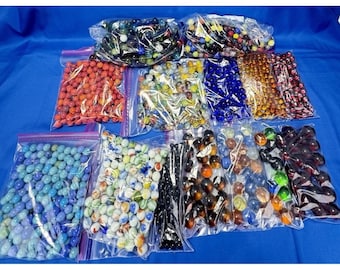 Canicas vintage de 8 kg (18 libras): canicas de 23 cm (9"), además de canicas de 15 mm (5/8"), 12,5 cm (1/2"), 9,5 mm (3/8") y 6 mm (1/4") de colores variados.