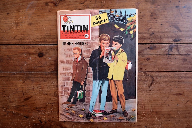 Peut inclure: Une bande dessin&eacute;e vintage Tintin intitul&eacute;e Le Journal des Jeunes de 7 &agrave; 77 ans, illustr&eacute;e de trois enfants en tenue d'automne. La couverture porte le texte Joyeuse Rentr&eacute;e et un encart jaune indiquant 36 pages.