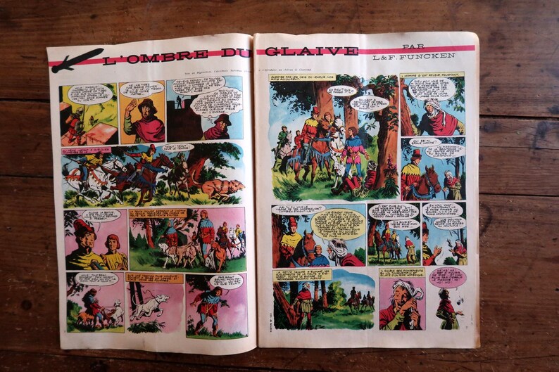 May include: An open comic book page titled L'OMBRE DU GLAIVE by L&F Funcken, featuring multiple colorful panels with illustrations of medieval characters, horses, and dogs in a forest setting, with French text bubbles throughout the pages.