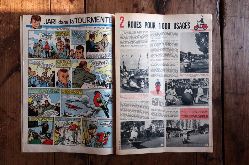 May include: Open vintage comic book pages with colorful illustrations. One page features a comic strip titled "JARI dans la TOURMENTE." The other page has images of scooters and the text "2 ROUES POUR 1000 USAGES."