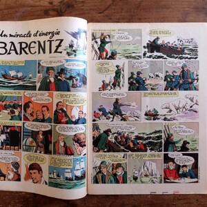 Puede incluir: P&aacute;ginas abiertas de un c&oacute;mic vintage titulado "Barentz". Los paneles del c&oacute;mic representan escenas hist&oacute;ricas con barcos, exploradores y osos polares. El texto de la portada dice "Un miracle d'&eacute;nergie Barentz".