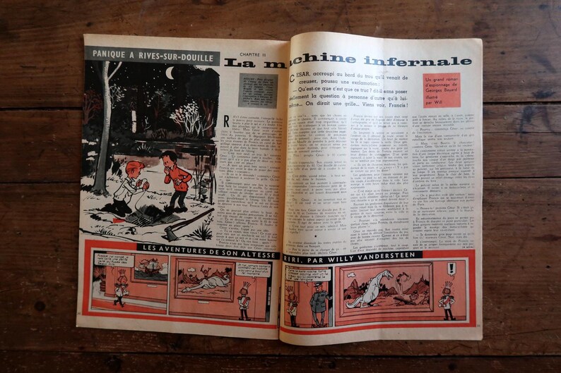 May include: Open vintage book pages with French text and illustrations. The left page features a comic strip with the title "PANIQUE A RIVES-SUR-DOUILLE". The right page has the title "La machine infernale".