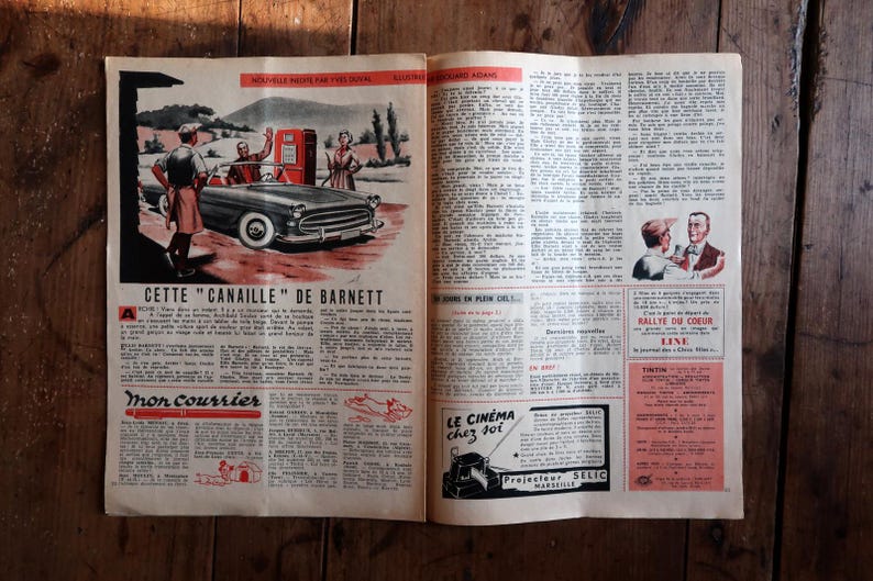 May include: Open vintage magazine spread with a car advertisement. The ad features a classic car at a gas station with people. Text includes "CETTE CANAILLE DE BARNETT" and "Mon courrier". The page has a reddish-brown hue.