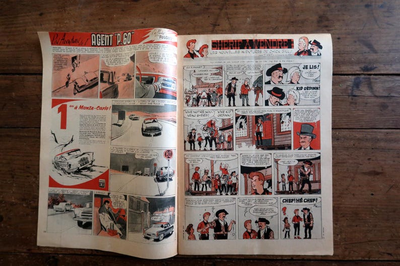 May include: A vintage comic book spread featuring two distinct stories. The left page is titled Agent P.60 and depicts car racing scenes. The right page is titled Sherif a Vendre and shows a western-themed narrative with multiple panels and dialogue bubbles.