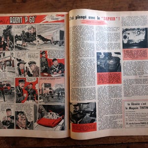 May include: A vintage comic book spread featuring the story Agent P.60 on the left page with colorful illustrations of characters and vehicles, and a text-heavy article titled J'ai plong&eacute; avec le SAPHIR on the right page with black and white photos.