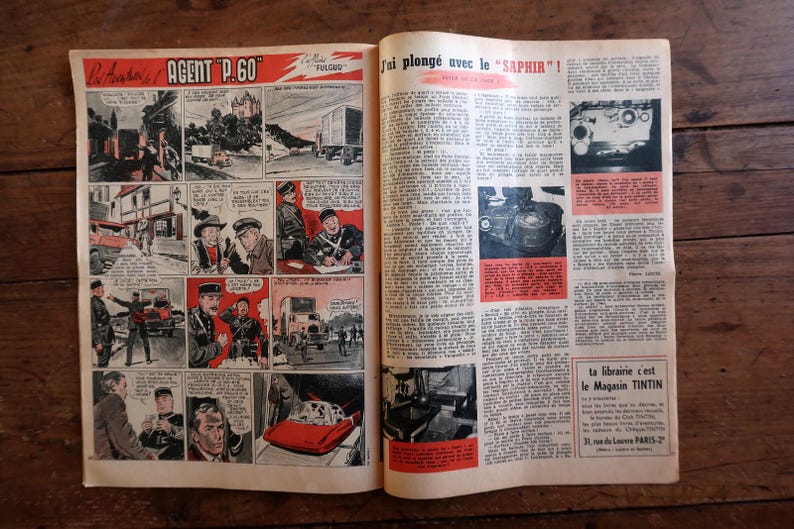 May include: A vintage comic book spread featuring the story Agent P.60 on the left page with colorful illustrations of characters and vehicles, and a text-heavy article titled J'ai plong&eacute; avec le SAPHIR on the right page with black and white photos.