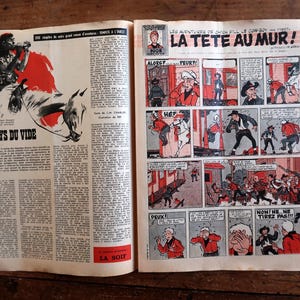 May include: A vintage comic book spread featuring the title LE PAYS DU VIDE on the left page and a multi-panel comic strip titled LA TETE AU MUR on the right page. The pages contain black and white text columns and colorful illustrations of cowboys.