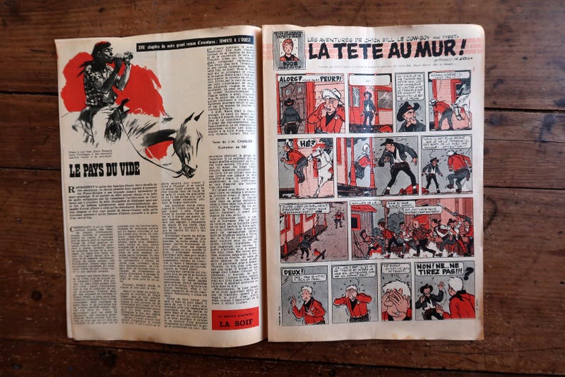 May include: A vintage comic book spread featuring the title LE PAYS DU VIDE on the left page and a multi-panel comic strip titled LA TETE AU MUR on the right page. The pages contain black and white text columns and colorful illustrations of cowboys.