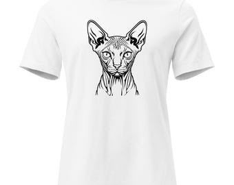 May include: White t-shirt with a black graphic of a Sphynx cat's face. The cat's face is intricately detailed with lines and curves. The shirt has short sleeves and a crew neck.