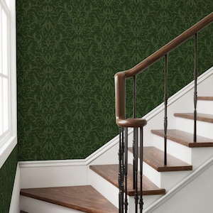 May include: A set of three ceramic mugs with a speckled, matte finish. Each mug features a different color: light blue, cream, and gray. The mugs have a simple, modern design and a comfortable handle.