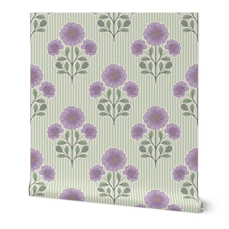 May include: A roll of wallpaper featuring a repeating pattern of purple flowers with green leaves and stems arranged on a light sage green background with thin, vertical white stripes. The floral design is symmetrical and evenly spaced.