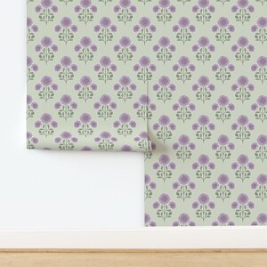 May include: Wallpaper featuring a repeating pattern of purple flowers with green stems and leaves arranged in vertical rows against a light sage green background with thin, vertical white pinstripes running throughout the entire design.