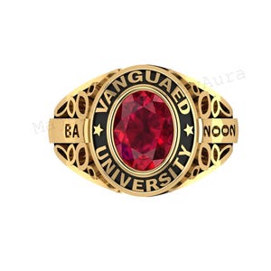 May include: A gold ring with a large, oval, red gemstone at the centre. The ring features the words "VANGUARD UNIVERSITY" in black lettering around the gemstone. The ring also has decorative filigree on the sides.