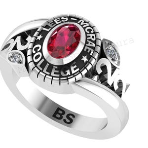 May include: A silver Lees-McRae College class ring with a large oval red stone. The ring features the college name and year, with small accent stones. The initials "BS" are engraved on the band.