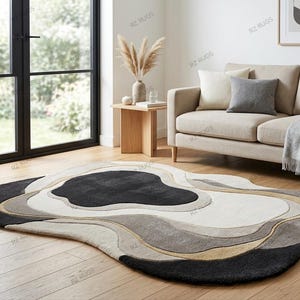 Nowoczesny, abstrakcyjny, nieregularny wełniany dywan – ręcznie tkany luksusowy dywan w neutralnych kolorach czerni, beżu i kości słoniowej | Nowoczesny, wyrazisty dywan do salonu