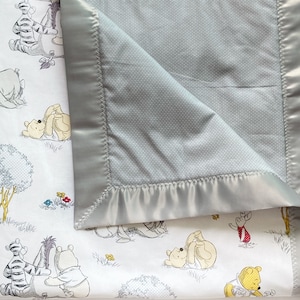 Baby crib quilt Blanket made from Winnie the Pooh fabric ~ gender neutral blanket ~ Cotton ~ satin binding - baby gift ~ personalize