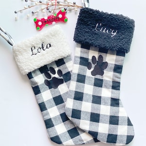 Pet personalized Christmas stocking in black and white flannel buffalo plaid for cat or dog, fully lined with embroidered paw, 18”
