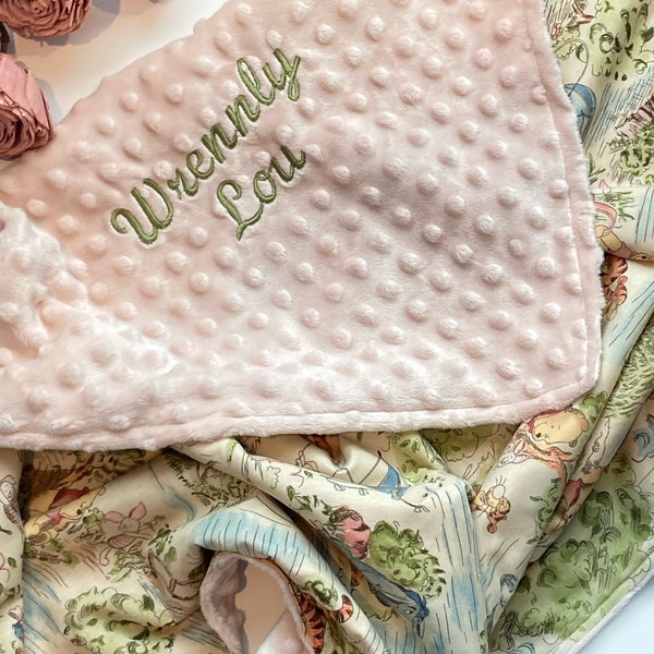 Baby blanket nursery bedding made from Winnie the Pooh fabric for boy or girl in Cotton and soft blush pink minky, personalized gift