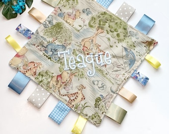 Baby tag lovey with pacifier snap tag and made from Winnie the Pooh fabric, personalized option sensory toy in cotton and minky or faux fur