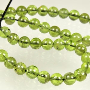 BARGAIN (10% off) ~ originally 16.48 ~ Beautiful Translucent Natural Genuine Peridot Smooth Round Beads- 4.5mm~ 44 beads~ 7.5&quot; strand~ C5770