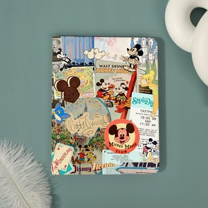May include: A rectangular notebook featuring a collage of vintage Disney imagery, including Mickey Mouse, Tinker Bell, castle illustrations, a Mickey Mouse Club sticker, and various park-themed graphics, tickets, and text elements on a colorful background.
