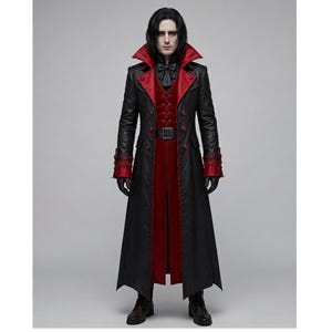 May include: A long black coat with a red lining and trim. The coat has a high collar, double-breasted buttons, and a belt. Red cuffs adorn the sleeves. The coat is worn with a red waistcoat and a black bow tie. Black gloves and boots complete the ensemble.