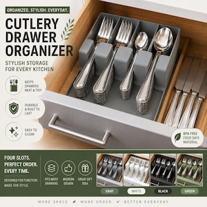 May include: A gray plastic cutlery drawer organizer with four vertical slots containing stainless steel forks and spoons. The organizer is inside a wooden drawer. Text on the image includes CUTLERY DRAWER ORGANIZER and BPA FREE FOOD SAFE MATERIAL.