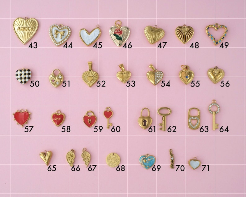 A collection of gold plated stainless steel charms in "love" theme. Charms include hearts, key and locks. Charms are laid out on a pink background with identifying numbers.