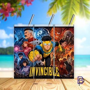 May include: Three stainless steel tumblers with the word "INVINCIBLE" in yellow. Each tumbler features a different comic book illustration with characters in action. The tumblers have silver straws and are set on a wooden surface.