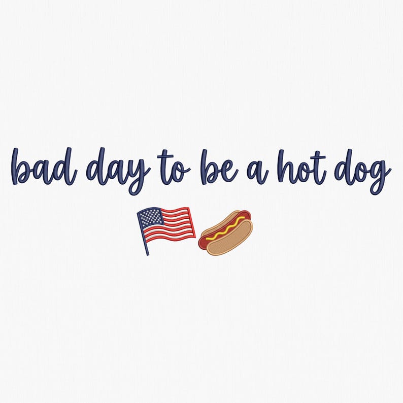 May include: A graphic design featuring the dark blue text "bad day to be a hot dog" in a cursive script font. Below the text, there is a small illustration of an American flag on a pole next to a hot dog in a bun with a line of yellow mustard.