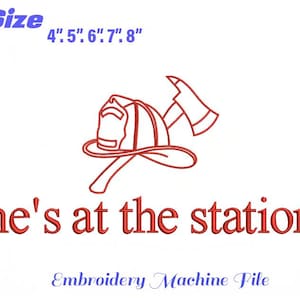 May include: Red line art of a firefighter's helmet and axe, with the text "he's at the station." Above the image are the words "5 Size" and "4", 5", 6", 7", 8". Below the image is the text "Embroidery Machine File."