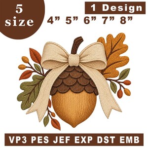May include: An embroidery design of an acorn with a beige bow, oak leaves, and small berries. Text includes 5 size 4" 5" 6" 7" 8" 1 Design and VP3 PES JEF EXP DST EMB. The acorn features a dark brown cap and a light brown nut with detailed stitching.