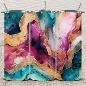Puede incluir: Tres vasos de acero inoxidable con un diseño abstracto colorido. El diseño presenta remolinos de rosa, azul, dorado y blanco.