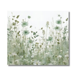May include: A field of white and green wildflowers with a blurred background.