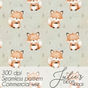 May include: A repeating pattern of watercolor foxes in shades of orange and brown, smiling on a light green background. The design includes small floral elements and the text "Julie's bloomboops".