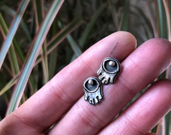 Melting Eye Stud Earrings