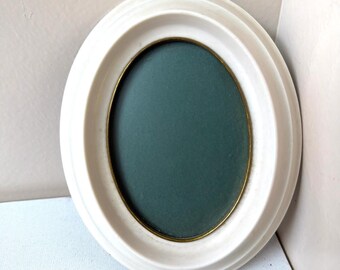 Marco ovalado vintage de baquelita (13,5 cm x 11 cm)