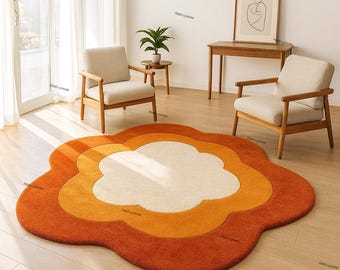 グルーヴィーなスタイルのレトロな花型ラグ - オレンジとブラウンの