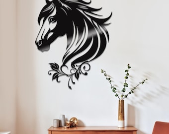 May include: A black metal wall art piece depicting a horse's head with flowing mane and decorative floral accents. The artwork is mounted on a white wall, adding a touch of elegance to the room's decor.