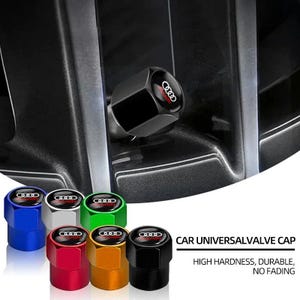 May include: A collection of colorful universal valve caps for cars. The caps are in various colors, including blue, silver, green, red, gold, and black. Each cap features a logo with a red background. The text "CAR UNIVERSAL VALVE CAP" is visible.