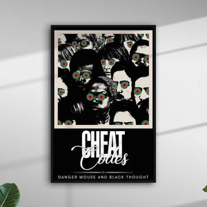 May include: Black framed poster featuring a crowd of faces with red and green eyes. The poster has the words "CHEAT Codes" in white script, with "DANGER MOUSE AND BLACK THOUGHT" below in smaller text. The artwork is a modern design.